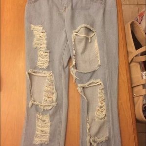 Ripped destroyed jeans
