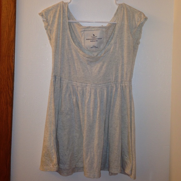 Light cream with hint of gray shirt