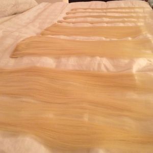 Platinum blonde clip in hair extensions