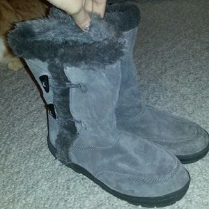 Grey buckled boots