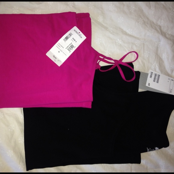 Two tank tops one with thin straps the other thick