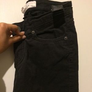 Worn once; corduroy grey pants, slim fit.