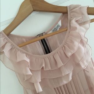 Beautiful loose sleeveless blouse