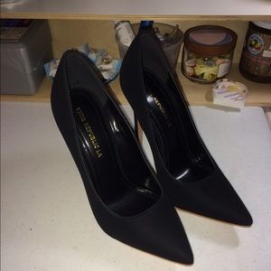 Black suede stiletto pumps
