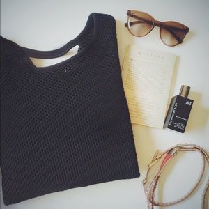 Black sweater back cutout.