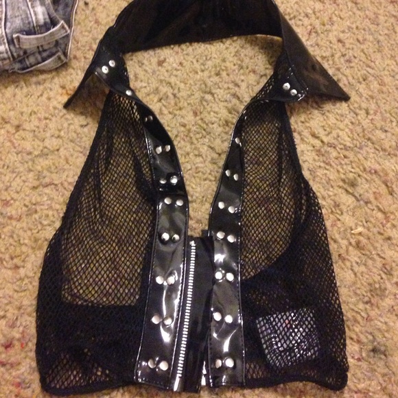Fishnet vest, punk-ish