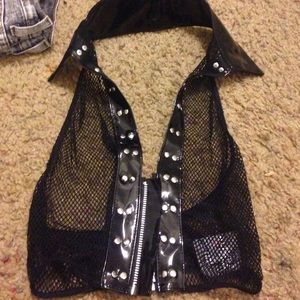 Fishnet vest, punk-ish