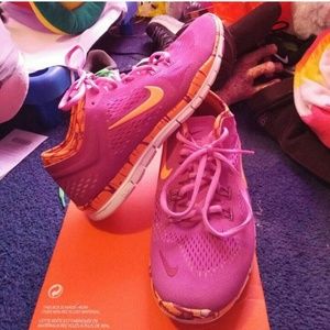 Nike 5.0s pink and orange.