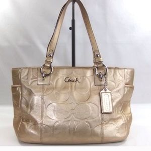 Gold coach bag