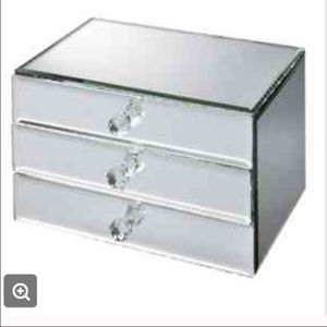 One mirrored box with drawers