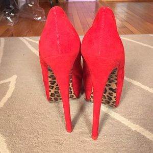 Sky high red pumps