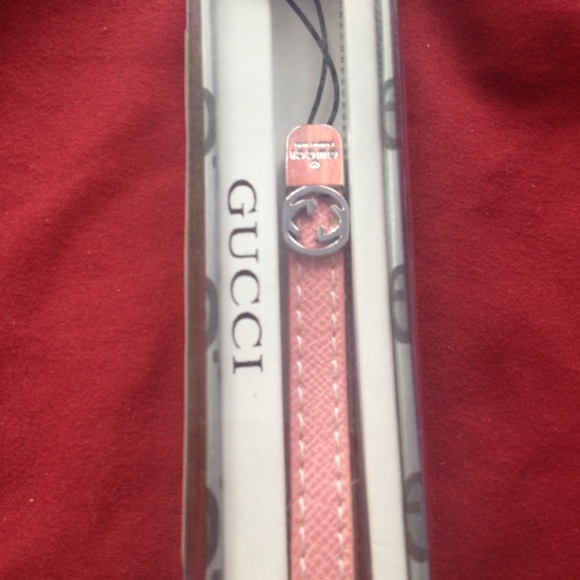 Phone accessory,pink Gucci ,new in the pack.