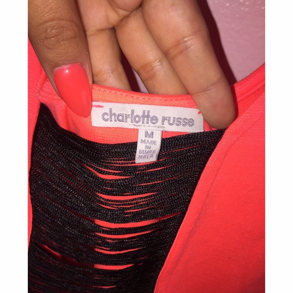 A orange pinkish dress. - Picture 4 of 4