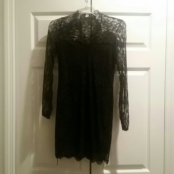 SOLD.  Black lace sheath dress