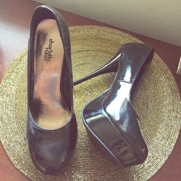 Black platform pumps.