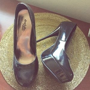 Black platform pumps.
