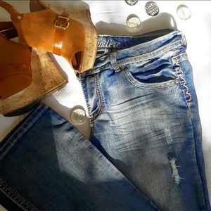 Distressed boot cut jeans