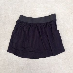High waisted black skirt