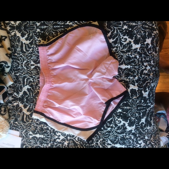 Pink Nike shorts