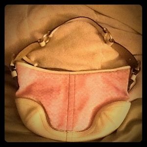 Pink stylish Coach purse