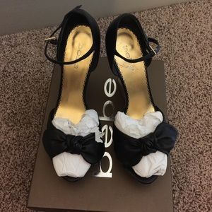 Black Bebe wedge sandal