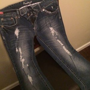 Distressed boot cut jeans