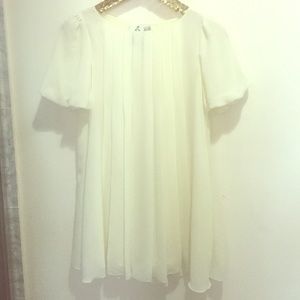 White pleated mini dress