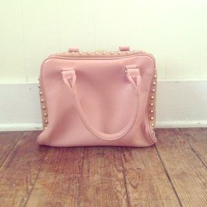 Pink studded handbag