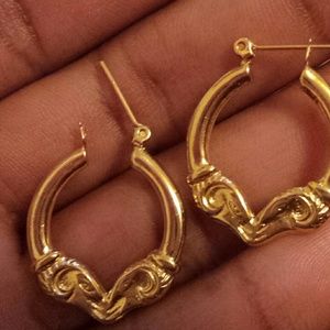 Small gold goat earrings