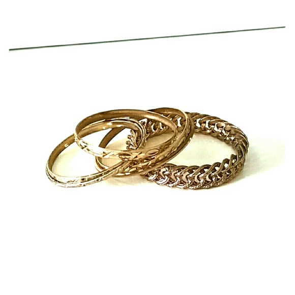 Set of gold bangle bracelets.