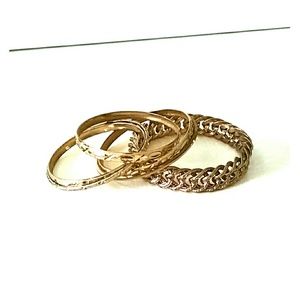 Set of gold bangle bracelets.