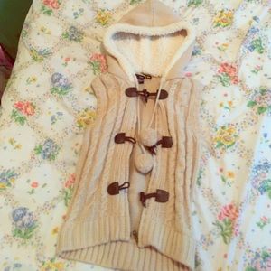 Hooded sweater vest.