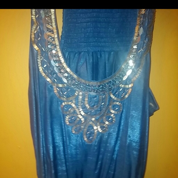 Beautiful crystal blue top with sequins.