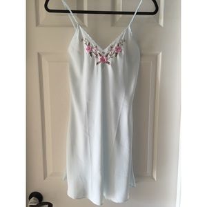 Pale blue silk slip with embroidered detail
