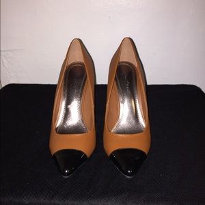 Cap toe faux leather pumps