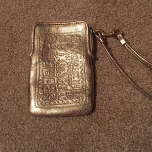 Small, gold, wallet. Perfect condition