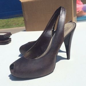 Brown leather pumps