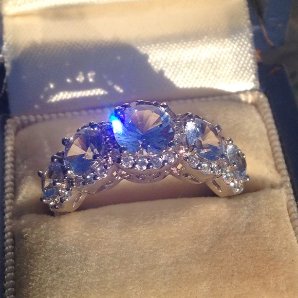 Aquamarine stone halo journey statement ring
