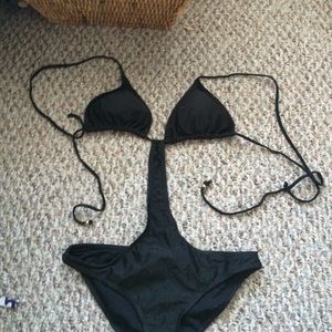 Black, backless one piece bathing suit