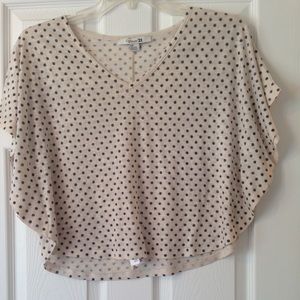 Black and cream polka-dot butterfly sleeve top