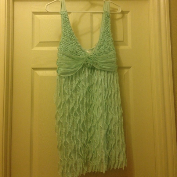 Adorable top with chiffon rosette detailing. - Picture 1 of 1