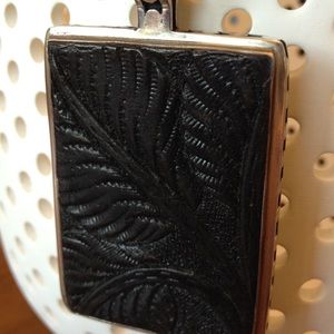 💥💥Brownish black tooled leather pendant.