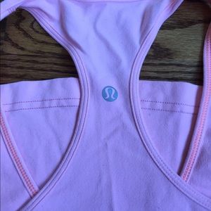 Lululemon racerback light pink tank top.