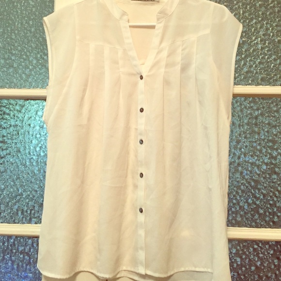 Sheer cream cap sleeve blouse