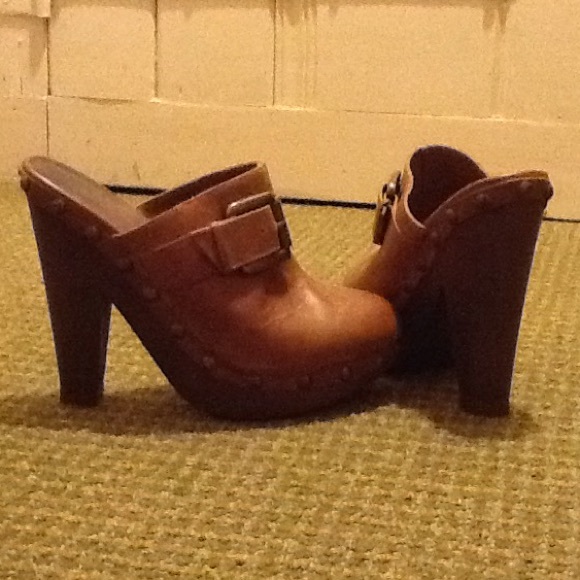 Brown leather clogs