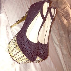 Spiked high heels