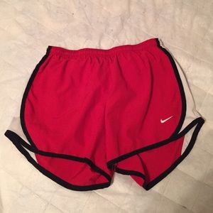 Red nike shorts