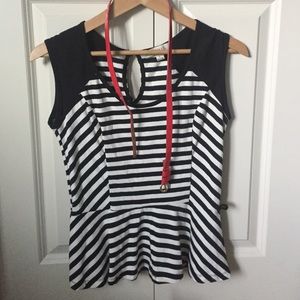 Striped top that flows at bottom w/ red belt