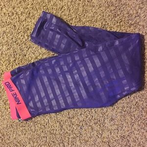 Purple striped Nike Pro Pants