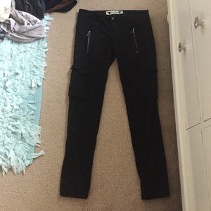 Black jeans with zippers on sides